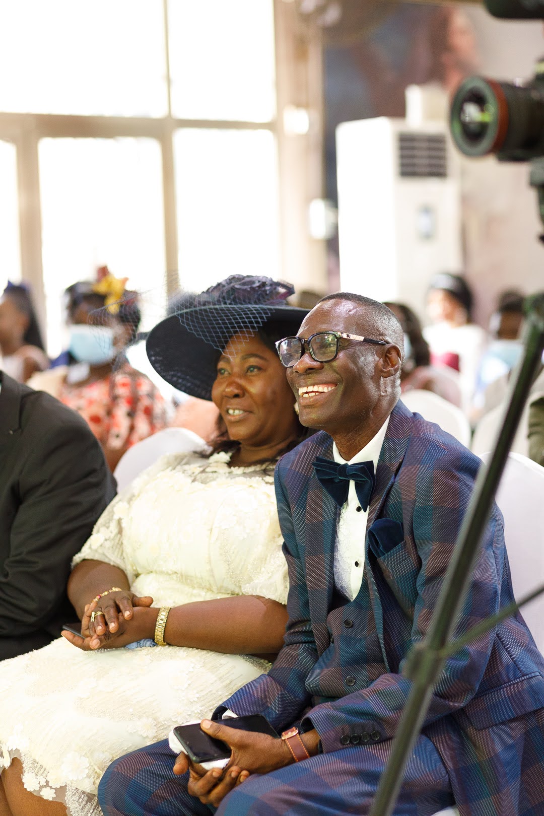 Couple enjoying the celebration from their seats